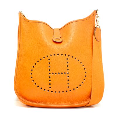 HERMES - Sac bandoulière Hermès Evelyne en cuir togo orange, garniture