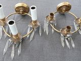 pair of brass and crystal wall sconces
