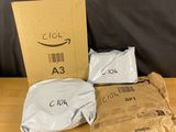 a box of amazon products sitting on top of a wooden table