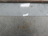 a close up of a metal object on the ground
