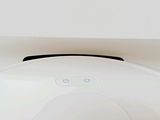 a white paper towel dispenser sitting on top of a counter
