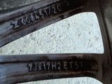 a close up of a wheel that has some writing on it