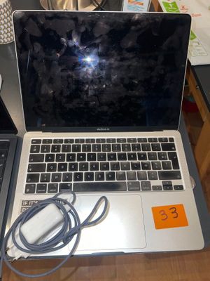 two laptops that are sitting on a table