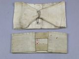 two pieces of cloth that have been stitched together on a table