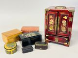 a small wooden cabinet and a small wooden box