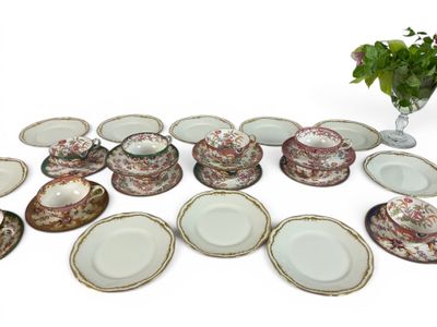 a lot of plates that are sitting on the table