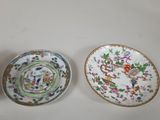three chinese porcelain bowls and a bowl on a white surface