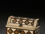 a white and brown box sitting on top of a table