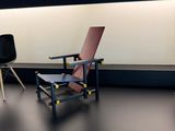a chair and a chair on a table in a room