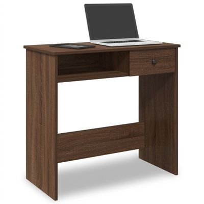 a computer desk with a laptop on top of it