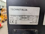 a close up of a machine that is in a factory