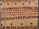 an old piece of cloth with a pattern on it