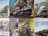 de nombreux livres sur les trains sont exposés sur la table