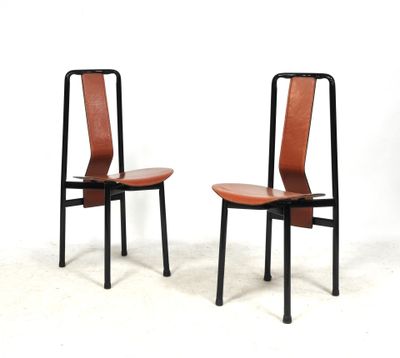 these are two chairs sitting next to each other on a white surface