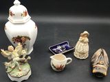 a lot of figurines that are on a table