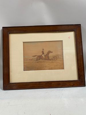 a picture of a man riding a horse in a picture frame