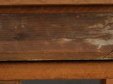 a close up of a piece of wood on a table