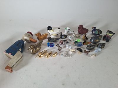 a lot of figurines that are sitting on a table