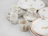 a lot of plates and cups sitting on a table