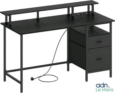 a black computer desk with two drawers and a keyboard on top
