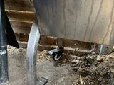 a close up of a metal object on the ground