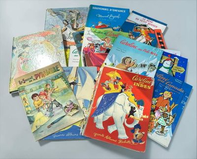 many children ' s books that are on the table