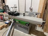an image of a table saw in a workshop
