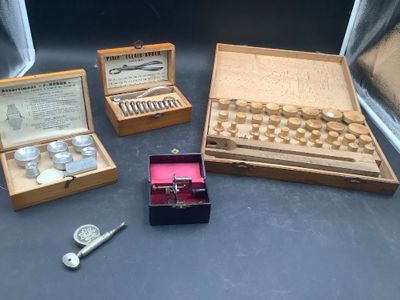 four different types of sewing tools in a box