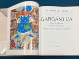an open book with a picture of a woman in a blue dress