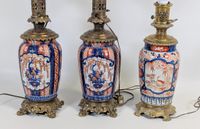 Paire de lampes à pétrole, en porcelaine polychrome type "im… (photo 2)