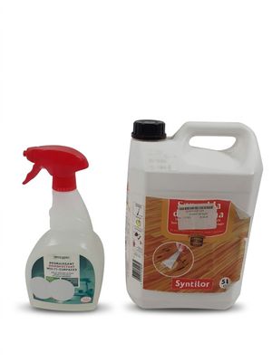 un gros plan sur un flacon de produit nettoyant à côté d'un autre flacon de produit nettoyant