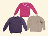 three sweaters with v - neck and long sleeves on a white background