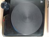 a turntable that is sitting on top of a table