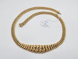 a gold chain necklace with a clasp on a white background