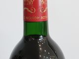 a bottle of wine that is sitting on a table