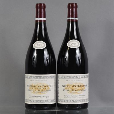 two bottles of wine sitting on top of a table next to each other