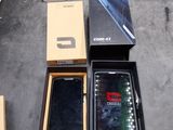 a box with a cell phone inside of it on a table