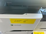 a printer that has a lot of labels on the side of it