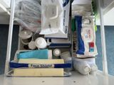 a close up of a shelf with a lot of items on it