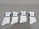 three pairs of white socks with black and white stripes on them