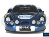 a picture of a blue race car on a white background