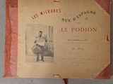 un vieux livre sur lequel est représenté un homme assis