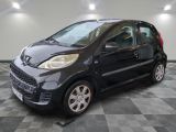 a picture of a small black car on a checkered floor