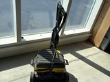 a robot that is sitting in front of a window
