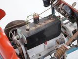 a close up of a motorcycle with a motor on the back of it