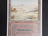 a picture of a card with a picture of a desert scene