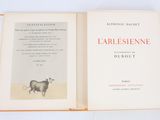 an open book with a picture of a cow on it ' s cover