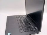 a laptop computer that is sitting on a table