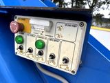 a close up of a control panel on the side of a blue truck