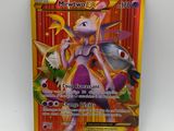 gros plan d'une carte pokemon sur une surface blanche
